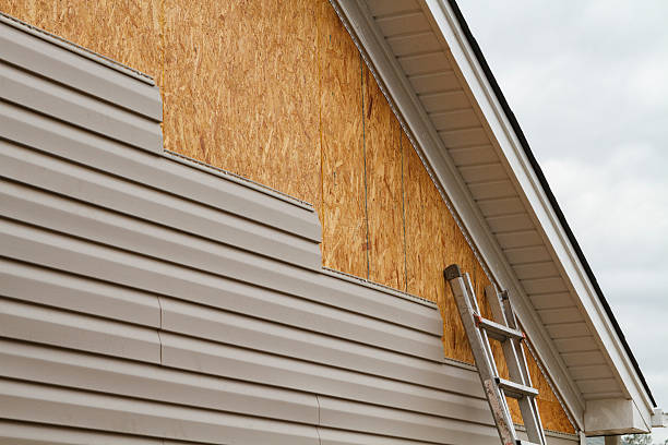 Professional Siding Replacement technician working in Newton, MA